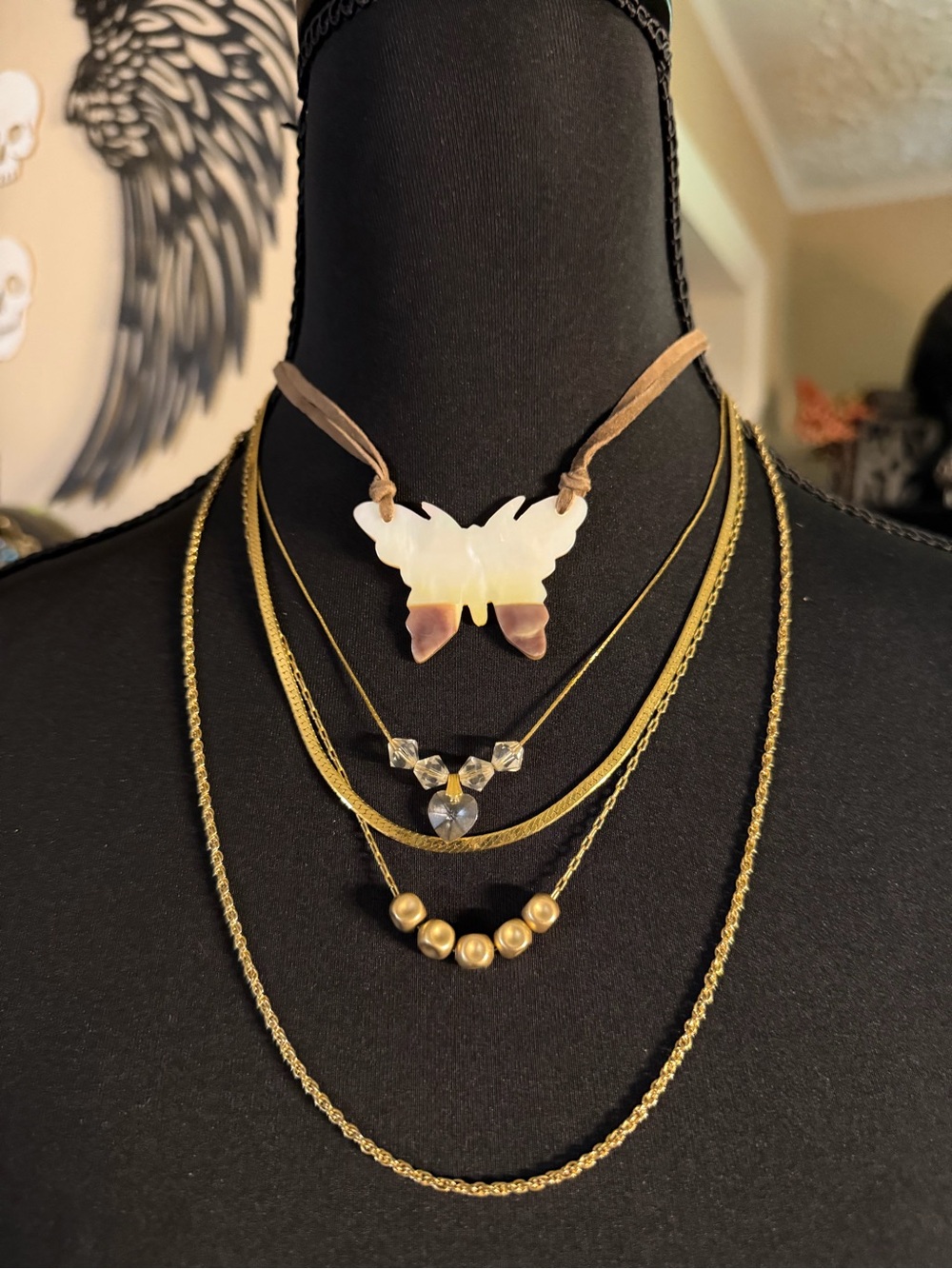 JEWELRY BUNDLE #8 
4 gold tone necklaces 1 suede
